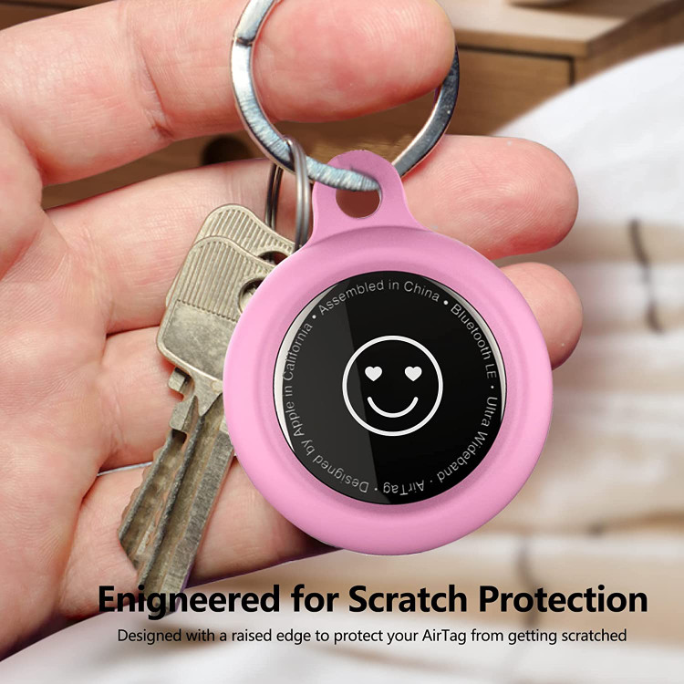 طراحی باز شدن یک طرف کاملاً نشاندهنده AirTag در مرکز است.